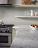 Domino Porcelain Tile Collection Gray Glossy Herringbone Mosaic Room Scene