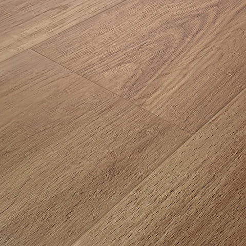 Mannington ADURA Flex Noble Oak Acorn luxury vinyl plank flooring swatch, a warm medium brown wood-look plank with natural oak grain texture