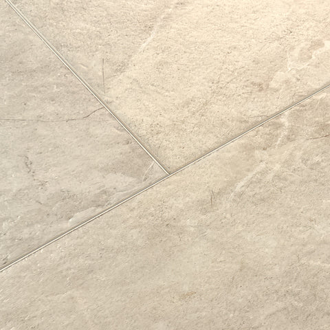 Mannington Luxury Vinyl Adura Rigid Lagos Resort warm cream stone visual luxury vinyl tile close-up swatch