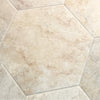 Mannington Luxury Vinyl Adura Apex Luxxe Caviar hexagonal tiles with a beige and brown pattern on a matching tile background swatch