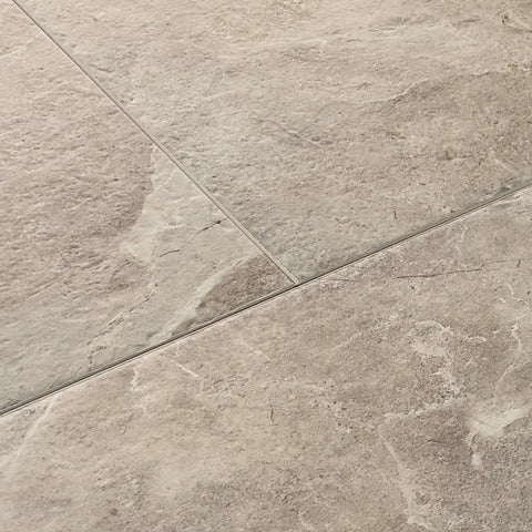 Mannington Luxury Vinyl Adura Max Lagos Cove Close-up of beige tiles with a visible grout line swatch