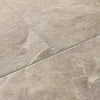 Mannington Luxury Vinyl Adura Max Lagos Cove Close-up of beige tiles with a visible grout line swatch