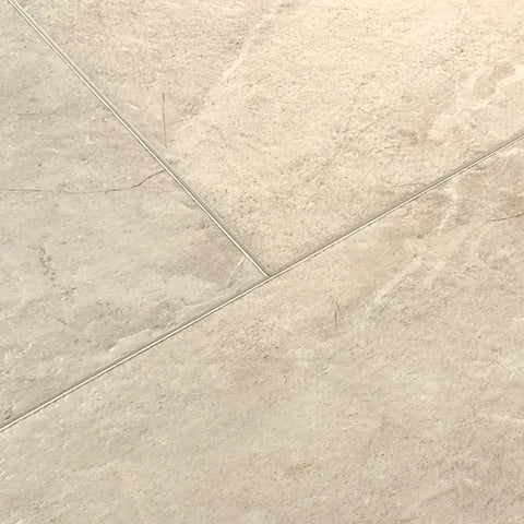Mannington Luxury Vinyl Adura Max Lagos Resort Close-up of beige tiles with a subtle pattern swatch